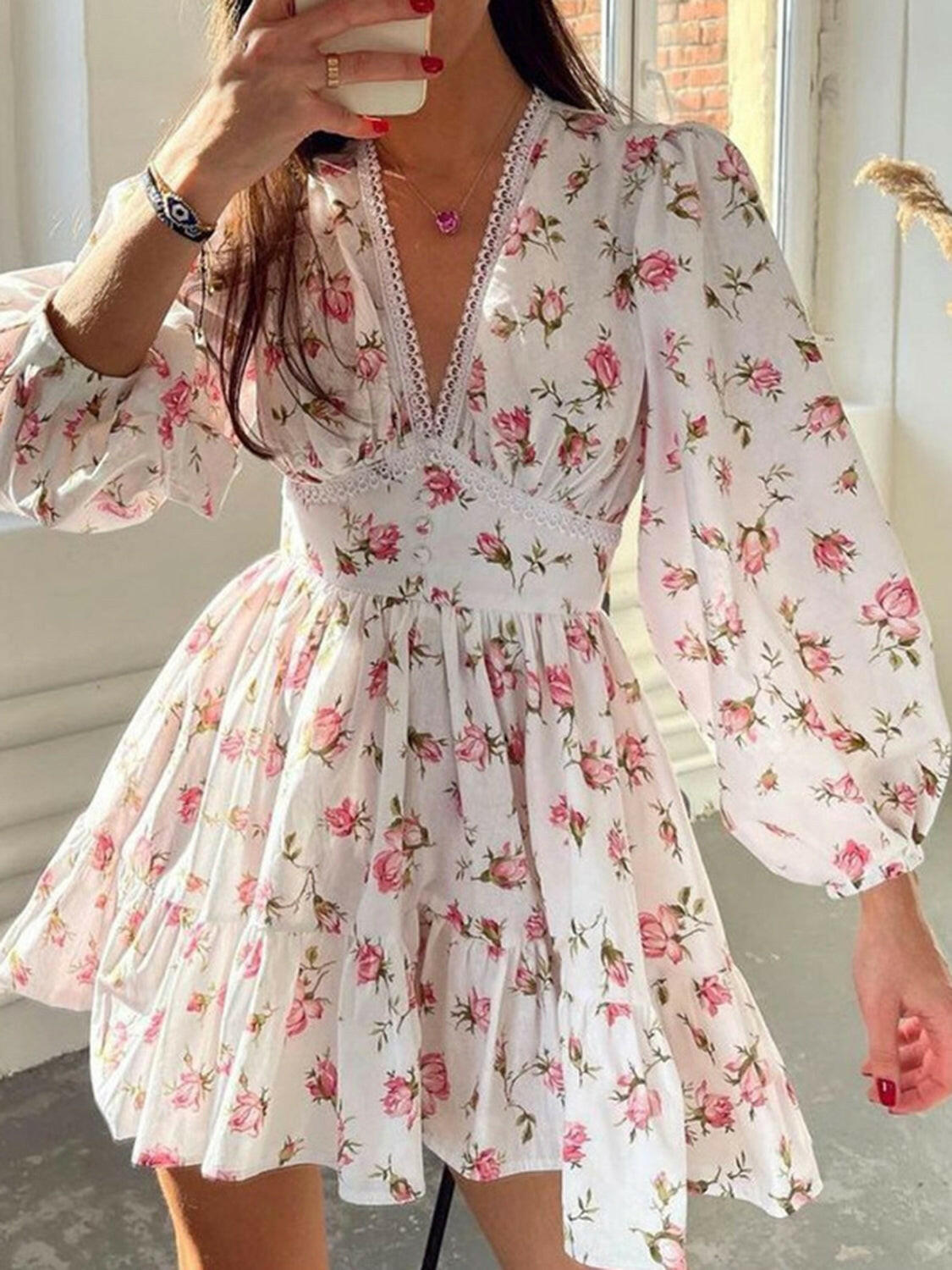 White floral lace detail V-neck balloon sleeve dress with ruched waist and decorative buttons