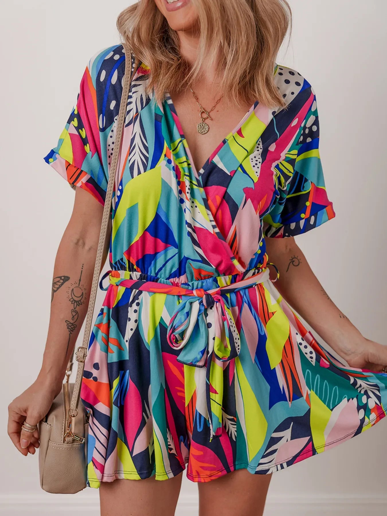 Multicolour tropical printed surplice neck tie waist romper with short sleeves and belted waist