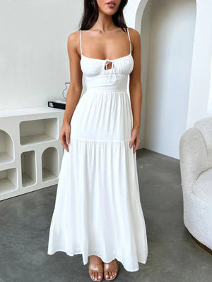 White tiered lace up spaghetti straps maxi dress with smocked bodice and slight stretch polyester fabric
