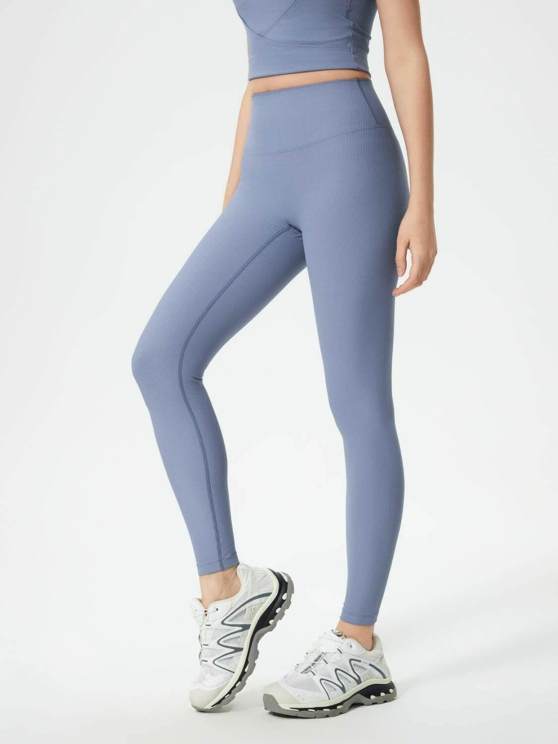 Millennia High Waist Active Leggings in blue with high stretch nylon-spandex fabric and a fitted silhouette.
