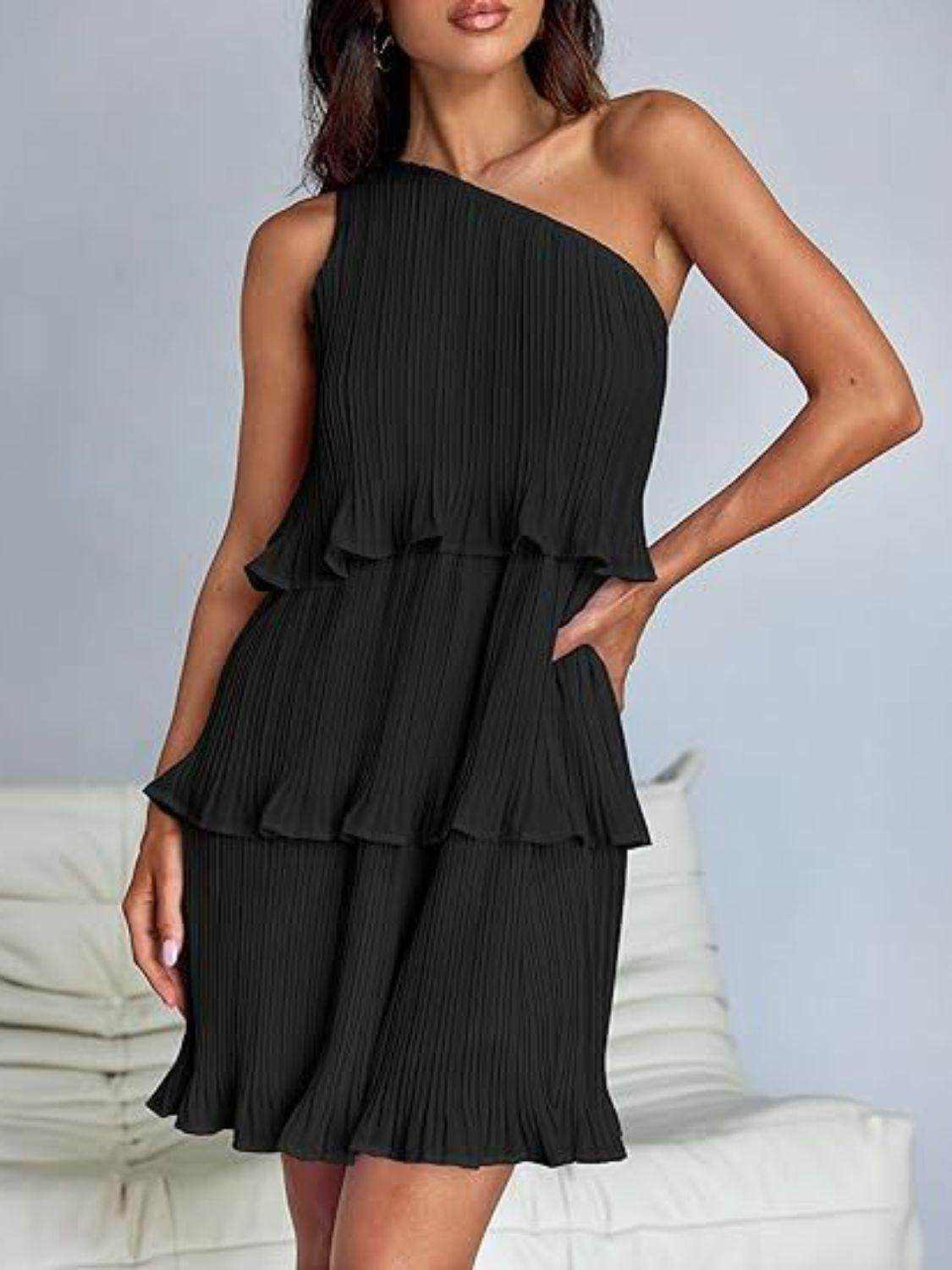 Black layered single shoulder mini dress with ruffled detailing and slightly stretchy fabric