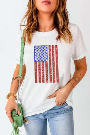 White US Flag round neck short sleeve t-shirt with sequin American flag design, worn with casual jeans