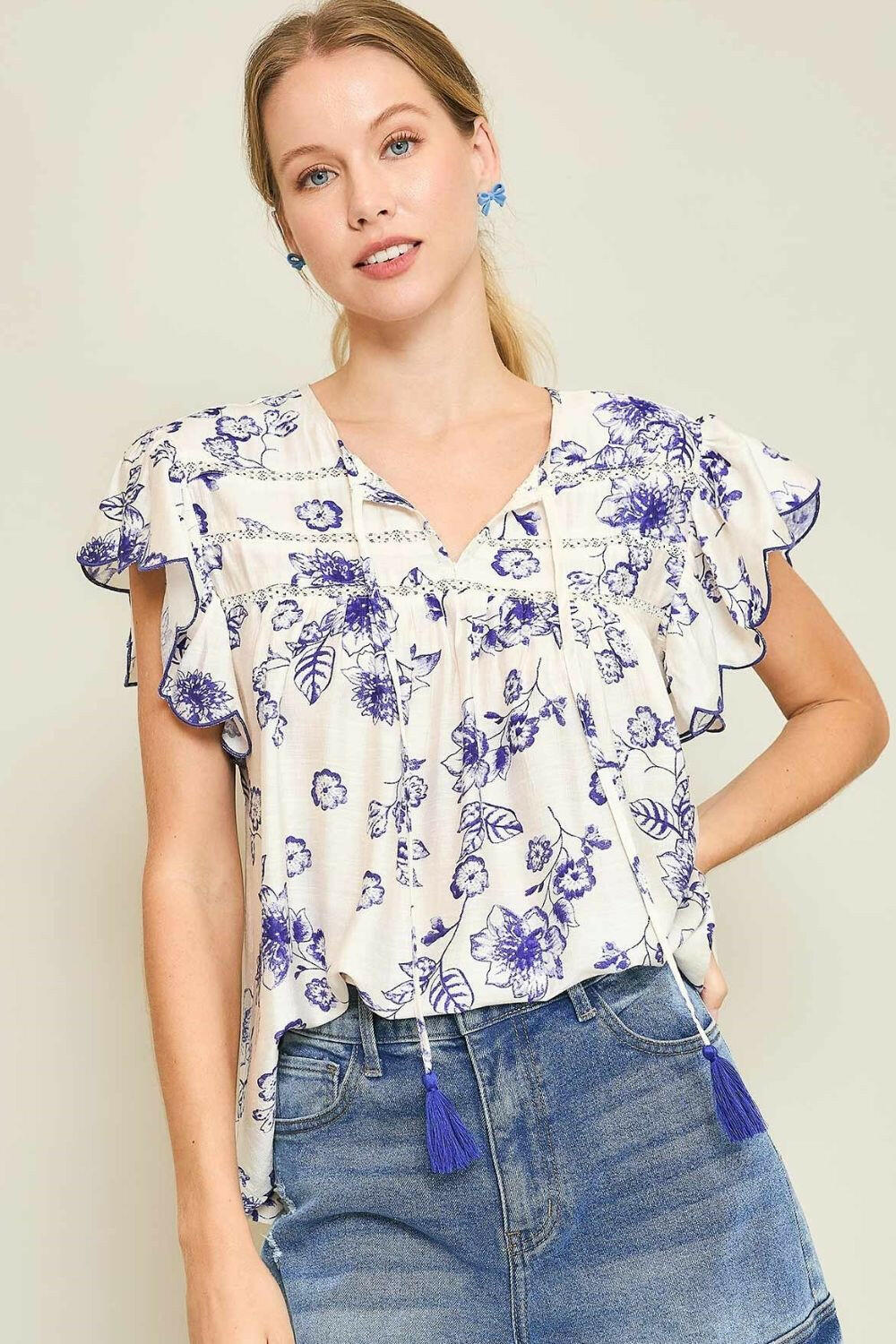 Umgee Full Size Floral Print Tassel Tie Neck Scalloped Sleeve Blouse Plus Size - StyleLure