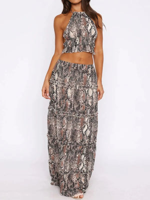 Halter crop backless top with frill detail and matching maxi skirt set in snake print